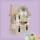 3d cardboard house being coloured in by a child