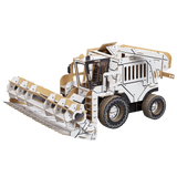 cardboard 3d puzzle of a combine harvester ready for painting