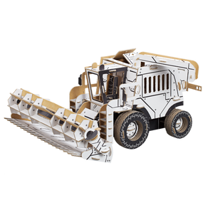 cardboard 3d puzzle of a combine harvester ready for painting