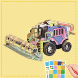 3d cardboard model of a combine harvester being painted by a child
