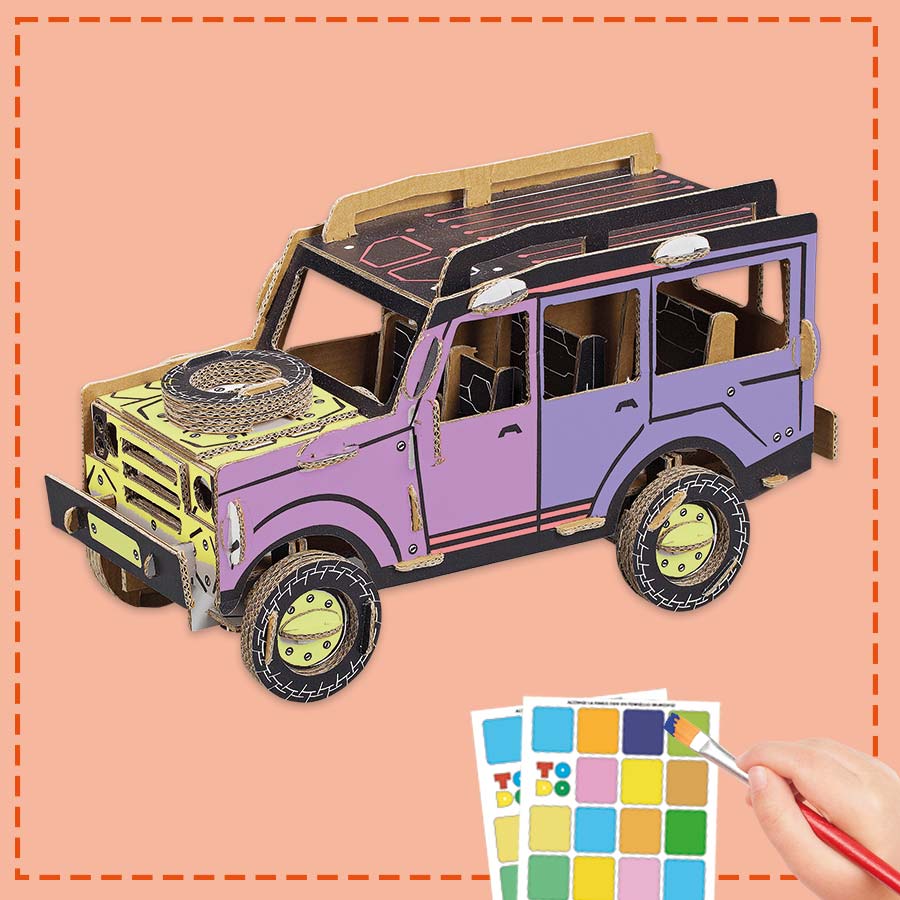 3d cardboard model of a jeep being coloured in by a child