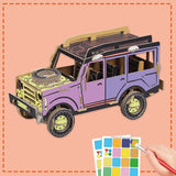 3d cardboard model of a jeep being coloured in by a child