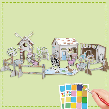 3d cardboard farm kit being painted by a child
