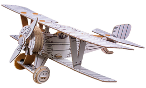 Cardboard model of a biplane with a propeller on a white background