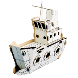 Cardboard model of a ship on a white background