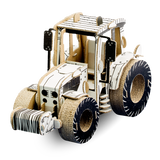 Cardboard model of a tractor on a white background