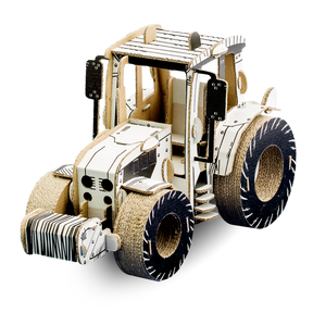Cardboard model of a tractor on a white background