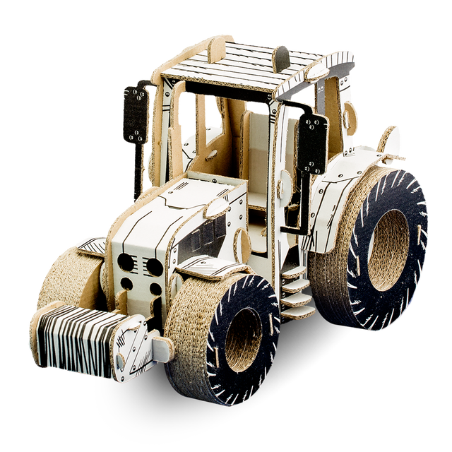 Cardboard model of a tractor on a white background